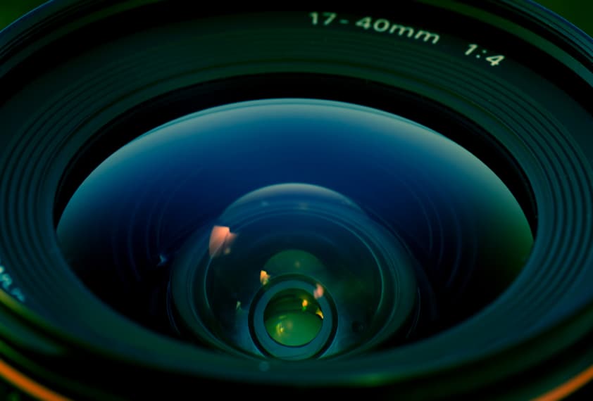 Investigator looking through binoculars